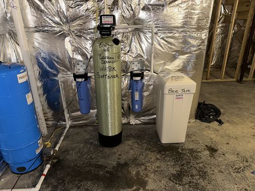 EcoSoft 48K electronic demand water softener with dual whole-house filters and a brine tank