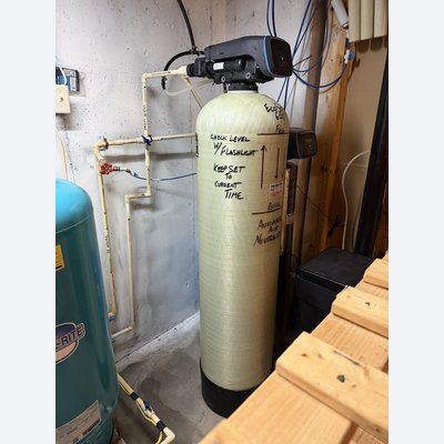 EcoSoft 6.0 cubic foot automatic acid neutralizer with a Well-Rite pressure tank