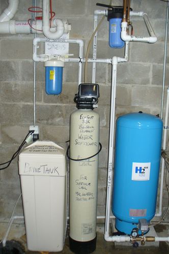 EcoSoft water softener, brine tank, and pressure tank installed together