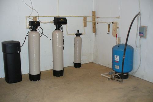TurboSoft water softener with an iron filter and pressure tank installed together