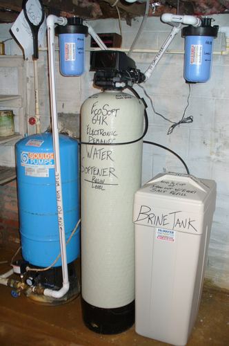 EcoSoft 32K water softener with dual whole-house filters and a brine tank