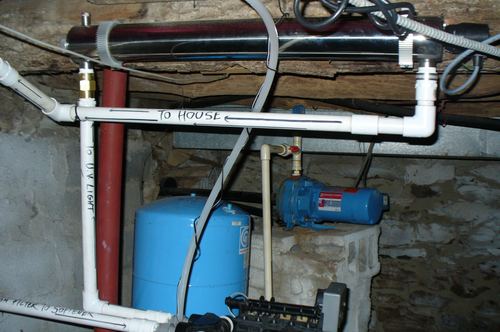 EcoSoft 32K electronic demand water softener with a brine tank