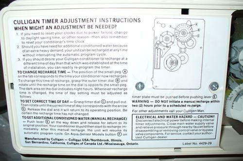 Close-up of a Culligan water softener control panel instruction label