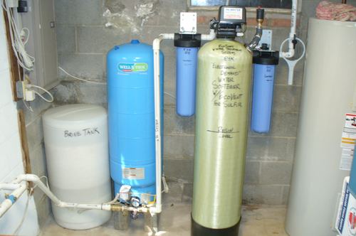 Well-X-Trol pressure tank, EcoSoft 64K water softener with EcoVent, and dual whole-house filters