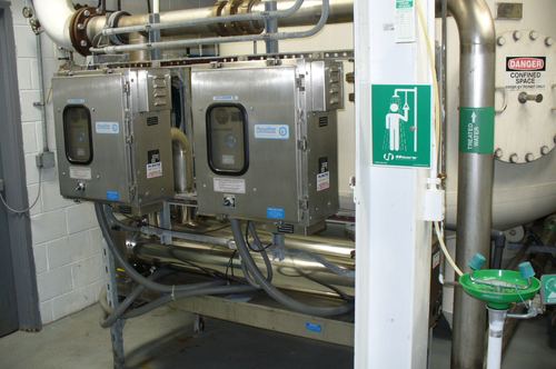 Commercial Aquafine UV disinfection system with dual cylinder cabinets serviced by Mr. Water LLC