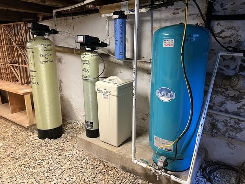 EcoSoft acid neutralizer, water softener, brine tank, and pressure tank installed together