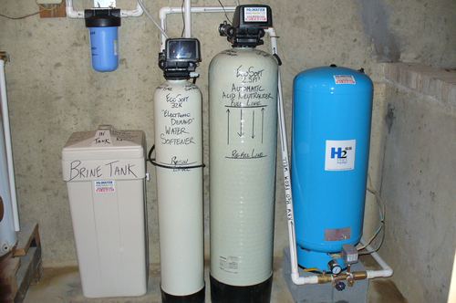 EcoSoft 32K water softener, acid neutralizer, brine tank, and pressure tank installed together