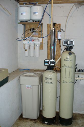 Custom reverse osmosis system, UV light, water softener, and acid neutralizer installed together