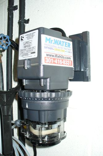 Close-up of a Stenner chemical metering pump
