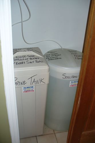 Brine tank and chemical solution tank with feed instructions