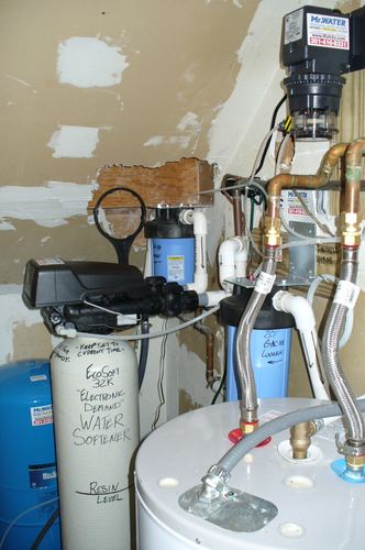 EcoSoft 32K water softener with a whole-house carbon filter and water heater