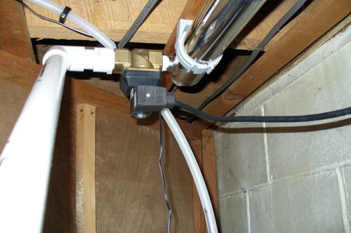 Close-up of a solenoid valve and UV light connection