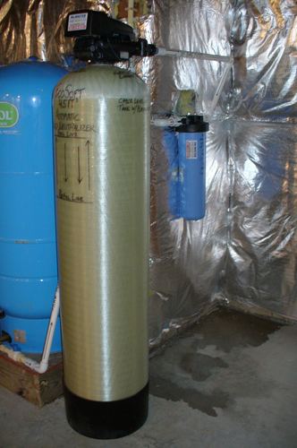 EcoSoft acid neutralizer with a pressure tank and Sterilight UV light