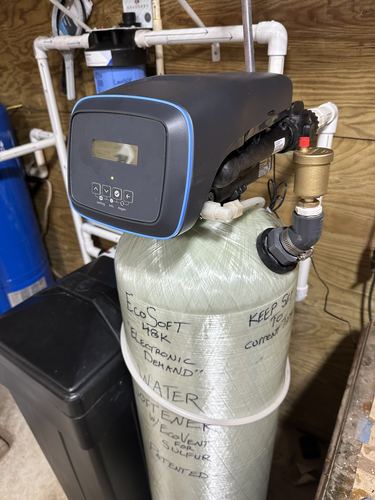 EcoSoft 48K water softener control panel and tank with salt level instructions