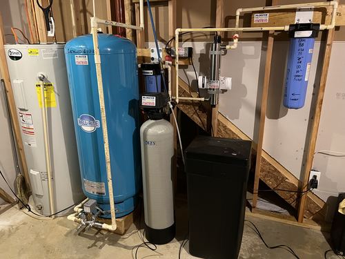 Well-Rite pressure tank, water softener, and whole-house filter installed together