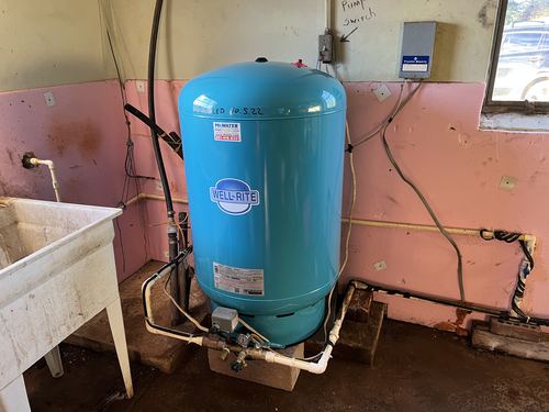 Well-Rite pressure tank installed in a basement utility area