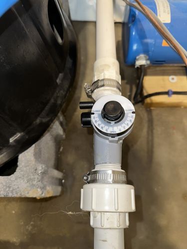 Close-up of a bypass valve on a water treatment tank