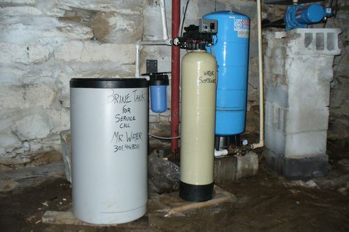 Brine tank, water softener, and well pressure tank installed together