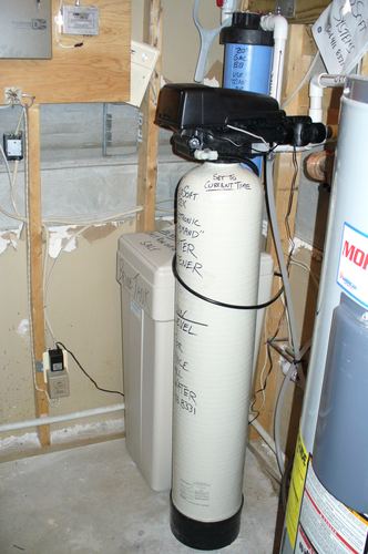 EcoSoft acid neutralizer with a brine tank and pressure tank
