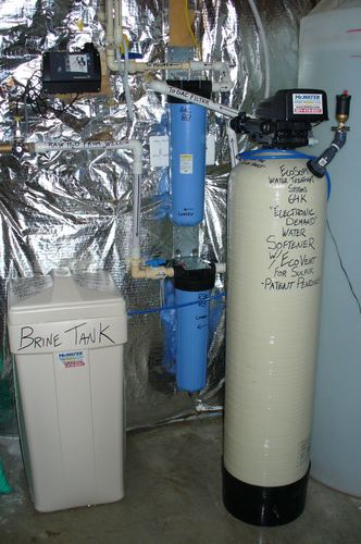 EcoSoft 64K water treatment system with EcoVent for sulfur removal and a brine tank