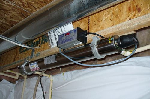 Close-up of a Sterilight UV disinfection light system with an electronic controller