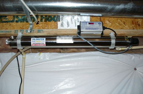 Close-up of a Sterilight UV disinfection light system with an electronic controller