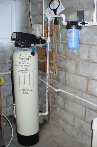 EcoSoft acid neutralizer with a whole-house carbon filter