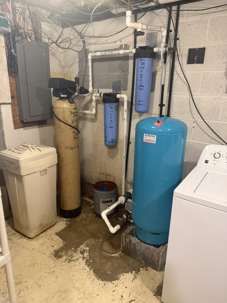 Basement water treatment system with softener, patented tank, and pressure tank installed together