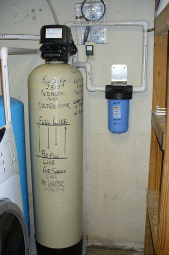 EcoSoft acid neutralizer with a whole-house carbon filter