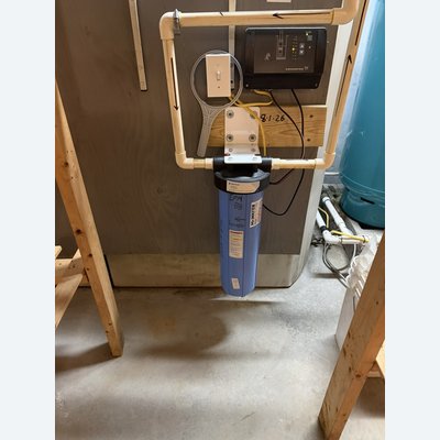 Pentair sediment filter housing with a Grundfos constant-pressure control panel