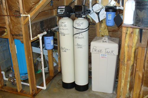EcoSoft acid neutralizer, water softener, and brine tank with a pressure tank installed together
