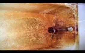 Rust-stained bathtub from untreated well water