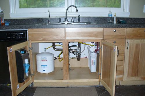 Custom reverse osmosis system installed under a kitchen sink