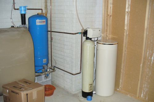 Pressure tank, Culligan water softener, and brine tank installed together