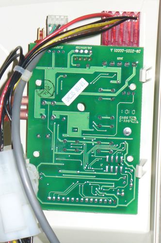 Close-up of a water softener control valve circuit board