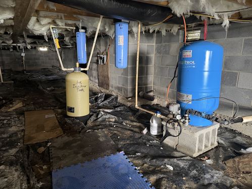 Air injection tank and whole-house filters installed in a crawlspace