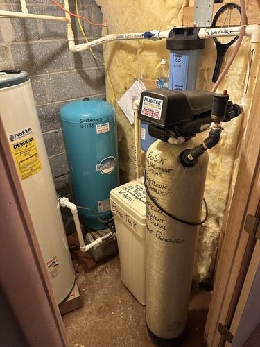 Water heater, Well-Rite pressure tank, and EcoSoft water softener with a brine tank installed together