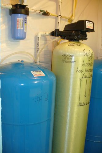 EcoSoft acid neutralizer with dual pressure tanks and a whole-house filter