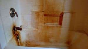 Orange iron staining from well water in a Maryland home