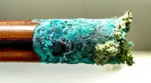 Copper pipe corrosion caused by acidic well water