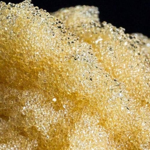 Cation exchange water softening resin closeup
